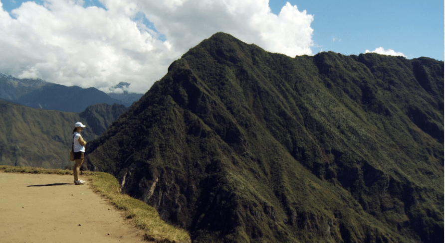 Woman standing on mountain